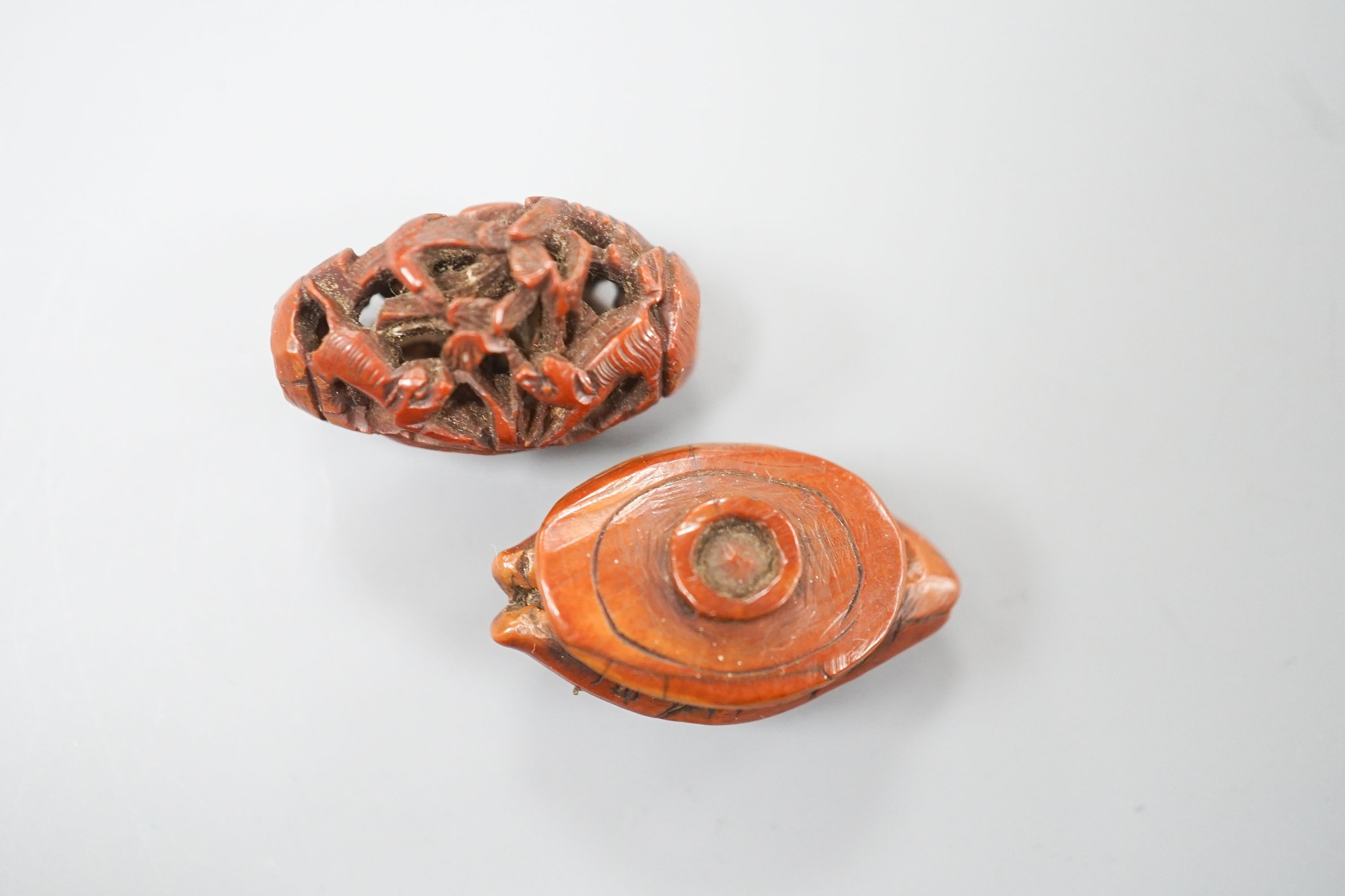 Two Chinese peach stone carvings